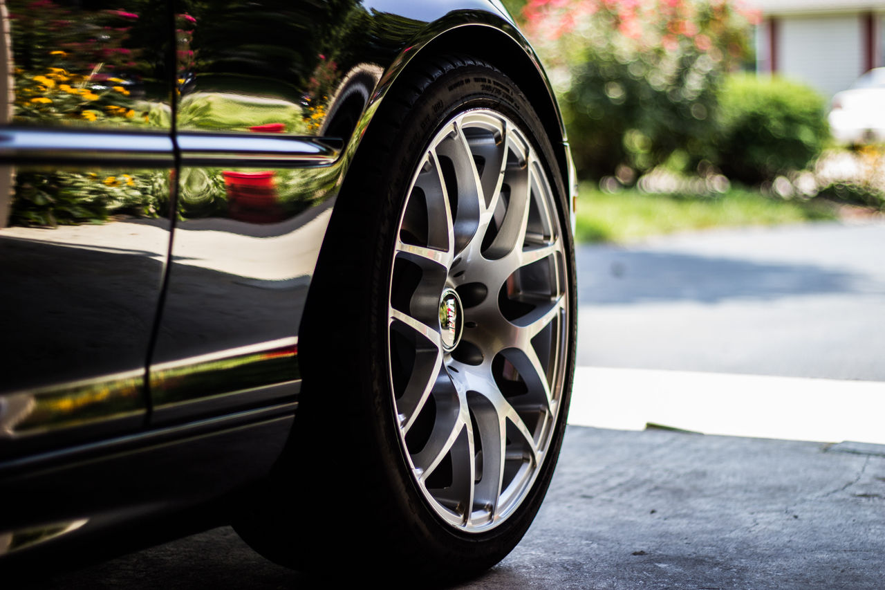 Side view of front car tire 